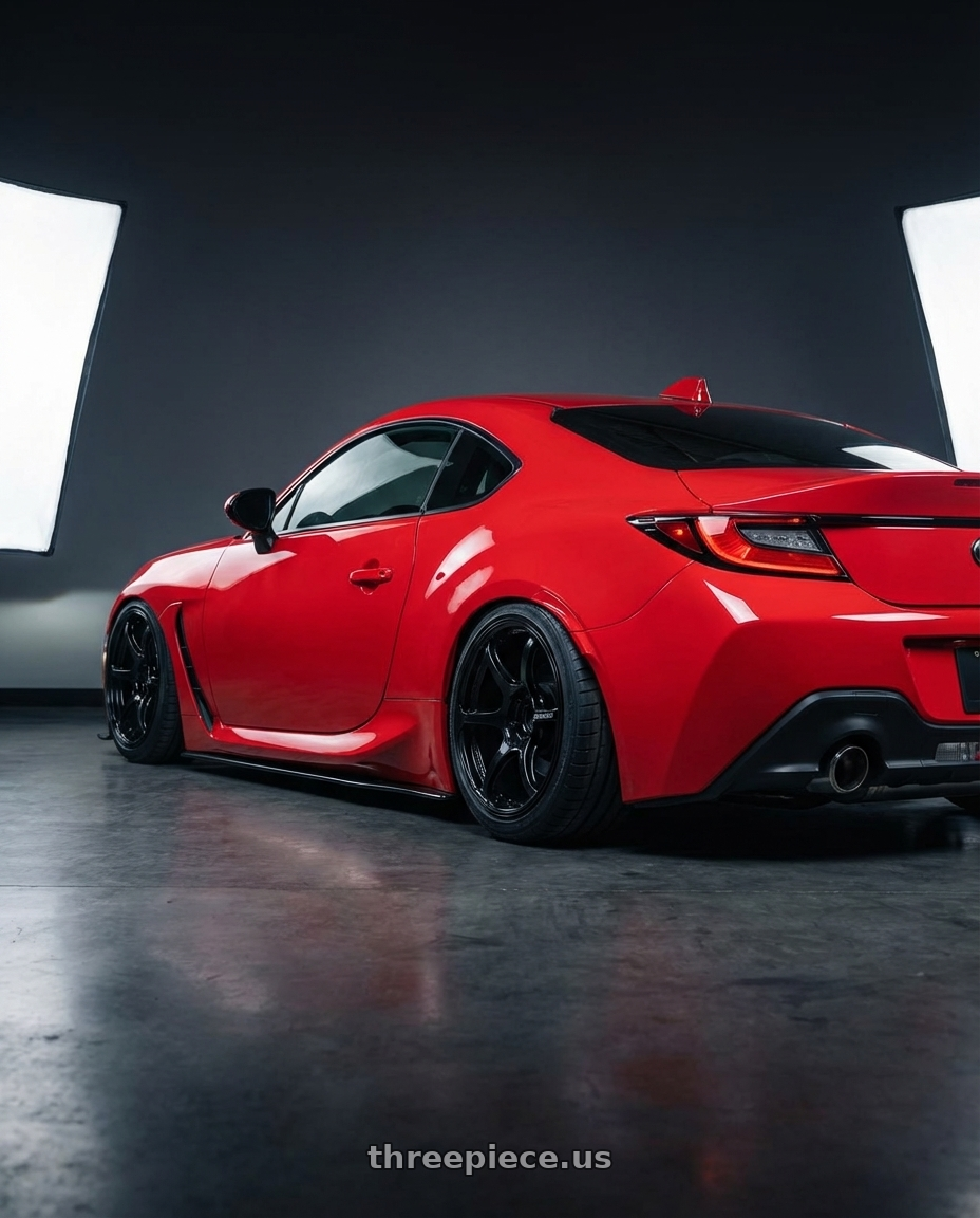 2024 Toyota GR86 with Advan RGIII 5x114.3 18x9.5+45 Gloss Black wheels rear three quarter view slight stretch tires