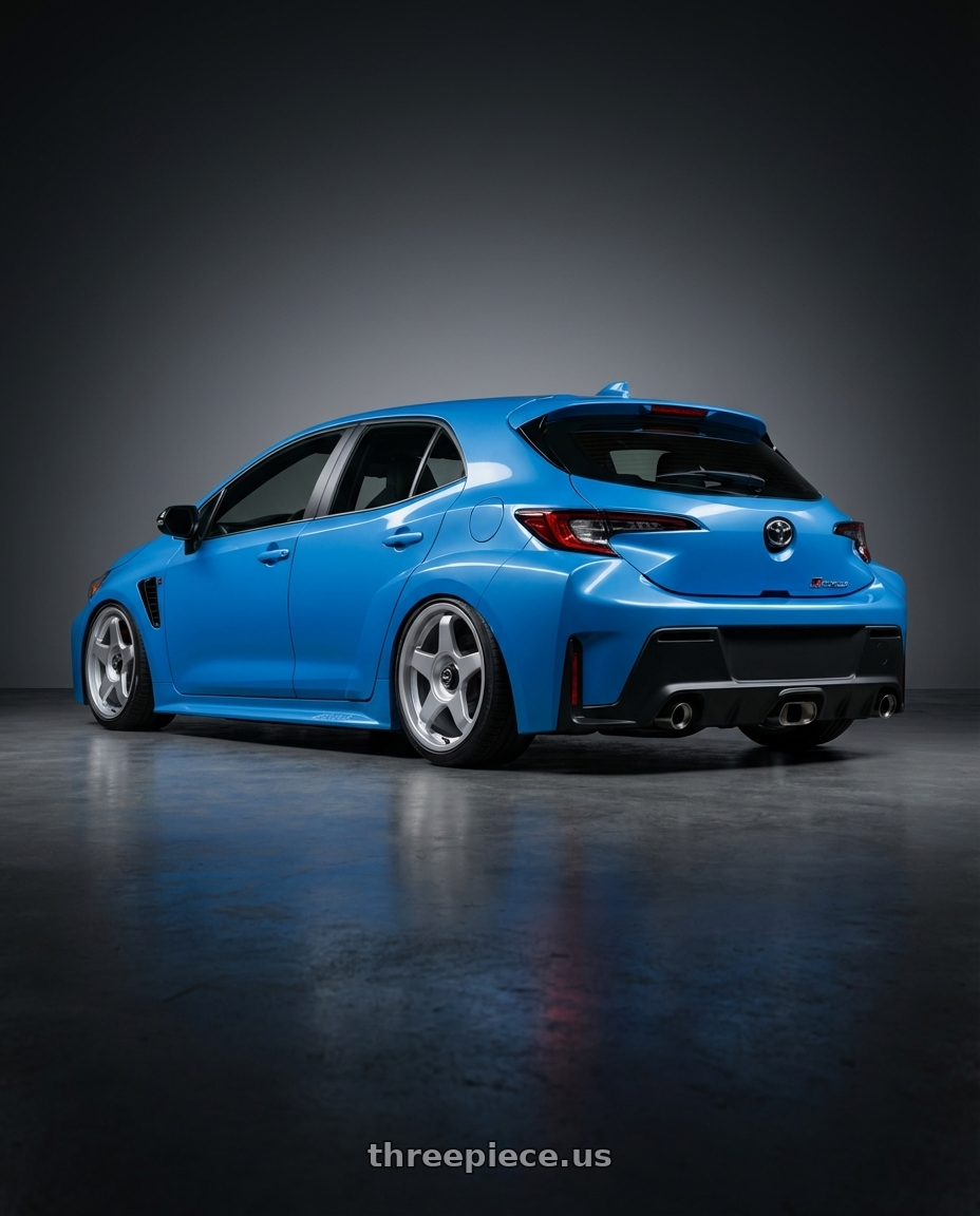 2024 Toyota GR Corolla with fifteen52 CHICANE 5x114.3 / 5x100 18x8.5 +35 SPEED SILVER (GLOSS SILVER) wheels rear three quarter view slight stretch tires