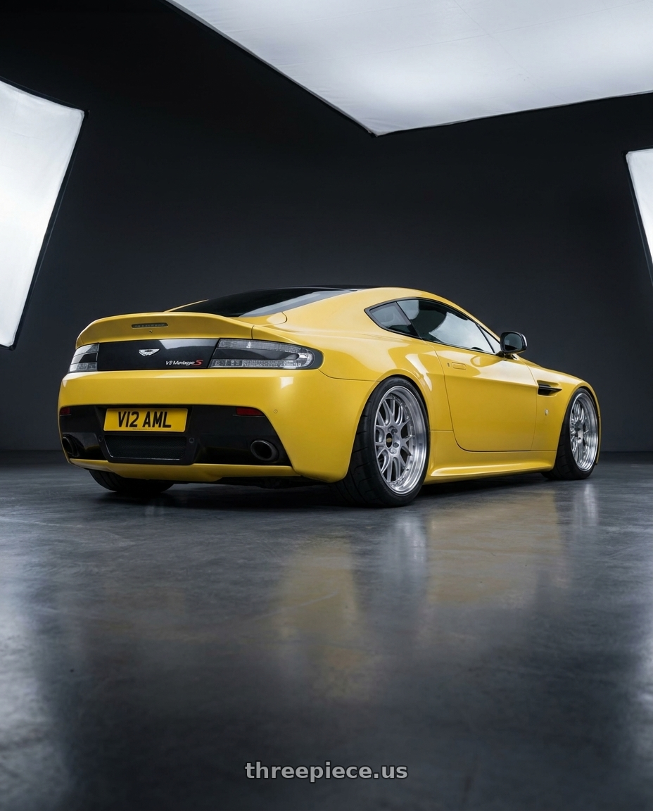 2014 Aston Martin V12 Vintage with BBS LM-R 5x120 19x9.5+25 Diamond Silver wheels rear three quarter view meaty tires