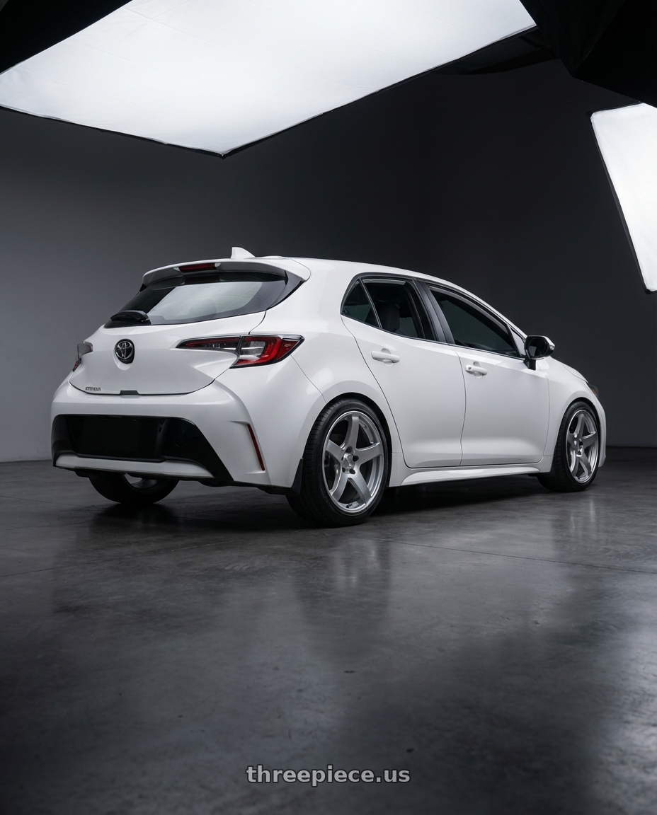 2023 Toyota Corolla Hatchback with Ssr Gtv01 5x114.3 18x8.5+40  GLARE SILVER wheels rear three quarter view square tires