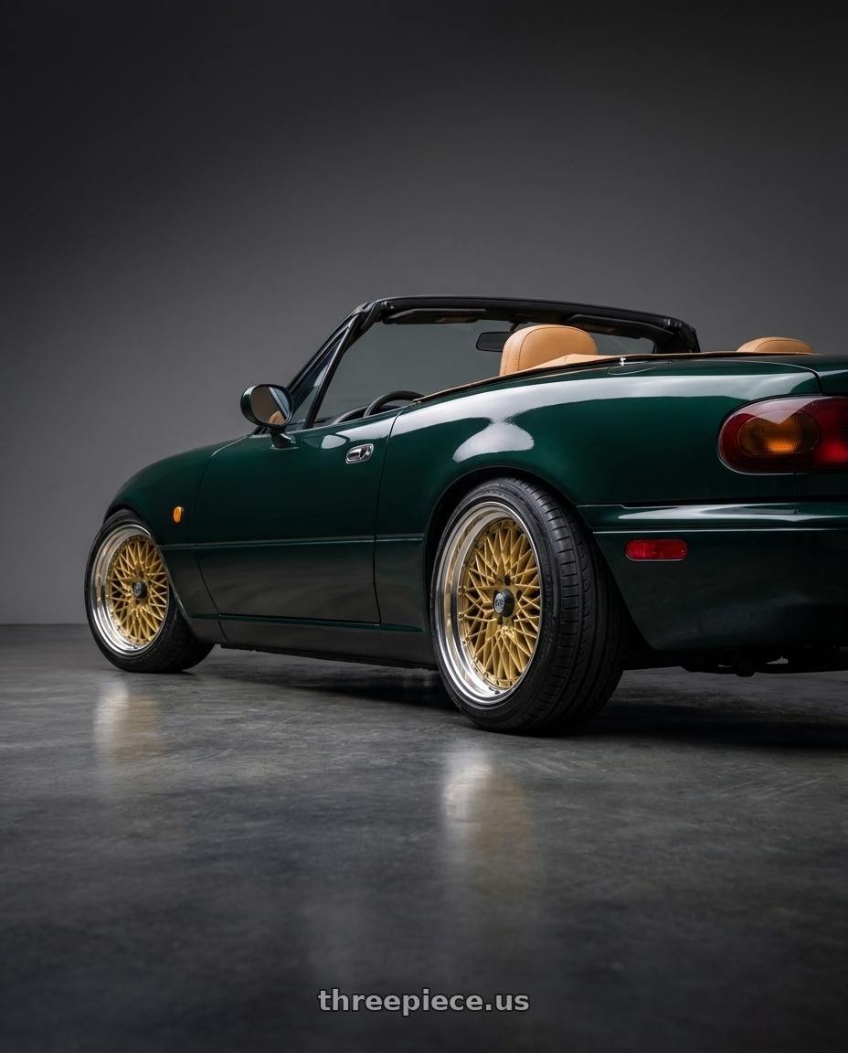 1993 Mazda Miata with SSR Formula MESH 4X100 16X8+52 NR Disk Fm Gold wheels rear three quarter view slight stretch tires