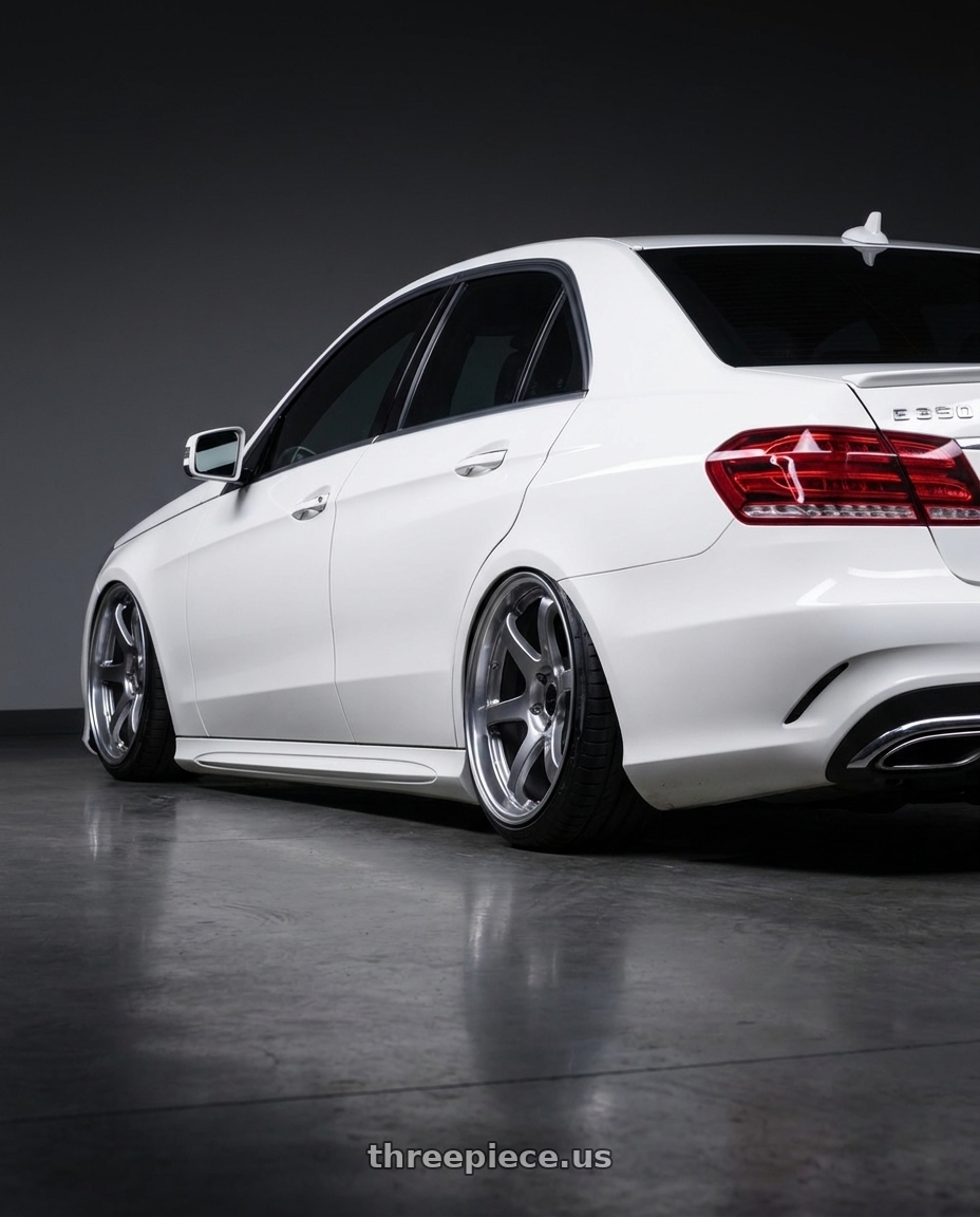 2014 Mercedes e350 white with Ssr Reiner Type 6S 5x112 19X9 30 Normal Disk Titan Silver wheels rear three quarter view extreme stretch tires