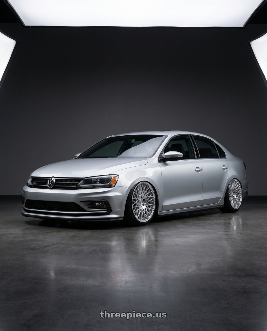 2016 Volkswagen Jetta GLI MK6 with Avant Garde Wheels M540 5X112 18x9 +48 Silver Machined wheels front three quarter view stanced stance