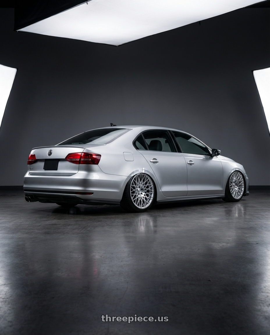 2016 Volkswagen Jetta GLI MK6 with Avant Garde Wheels M540 5X112 18x9 +48 Silver Machined wheels rear three quarter view slight stretch tires