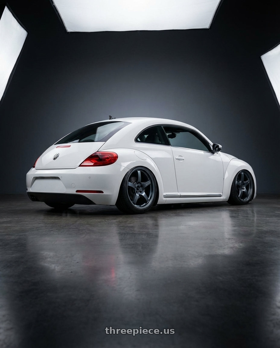 2016 Volkswagen Beetle Turbo with Gram Lights 57CR 5x112 19x9.5+25 Gunblue II wheels rear three quarter view slight stretch tires