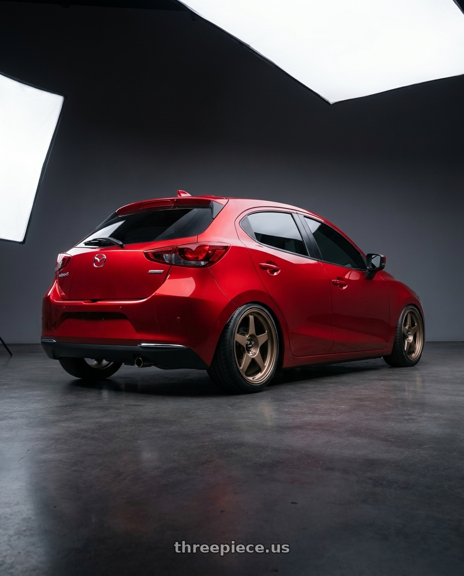 2022 mazda 2 with R6061 Forged R1 5x114.3 18X8.5 +35 Matte Bronze wheels rear three quarter view square tires