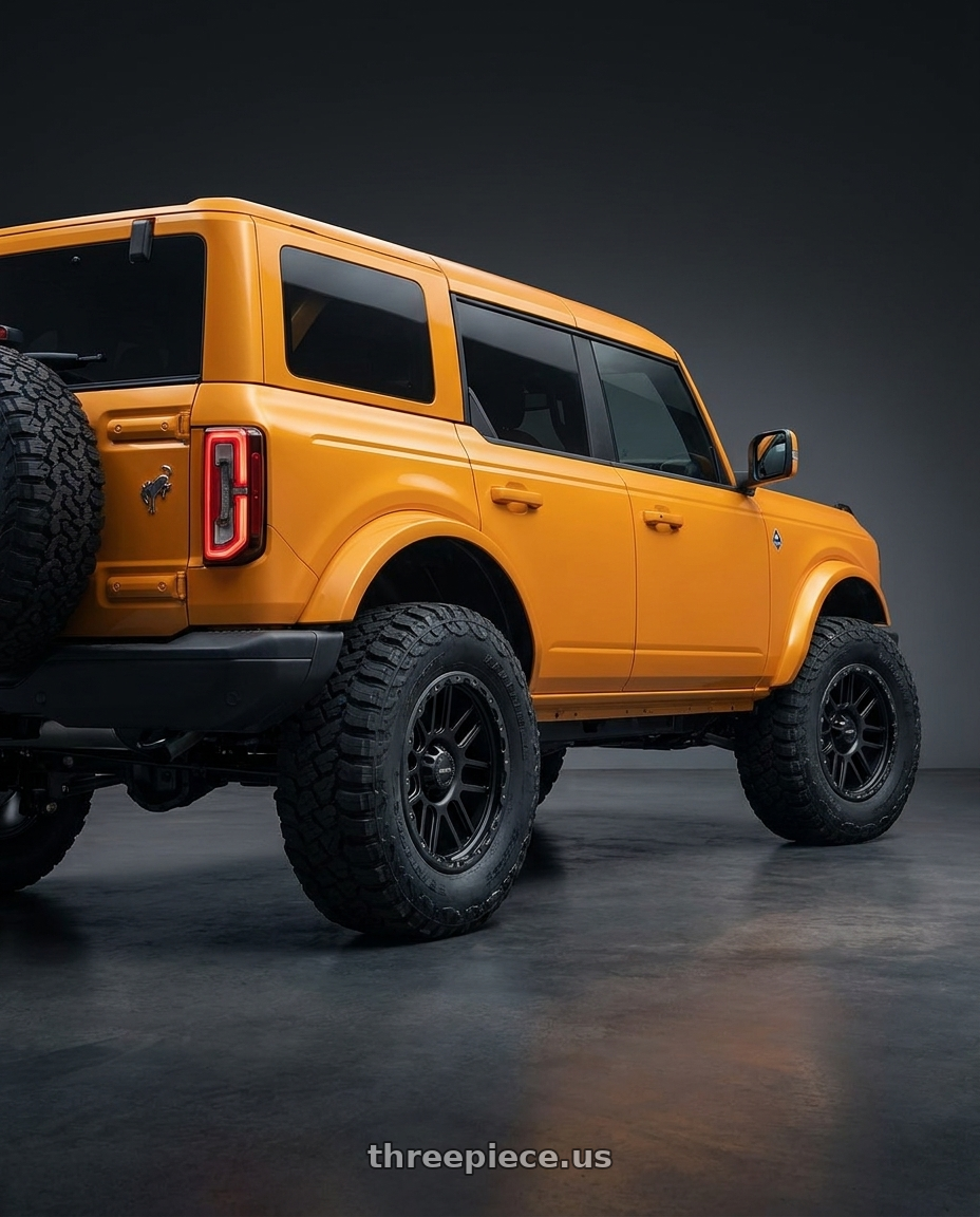 2024 Ford Bronco with Vision Off-Road 111 Nemesis 6x139.7 20x9+0 Matte Black wheels rear three quarter view meaty tires