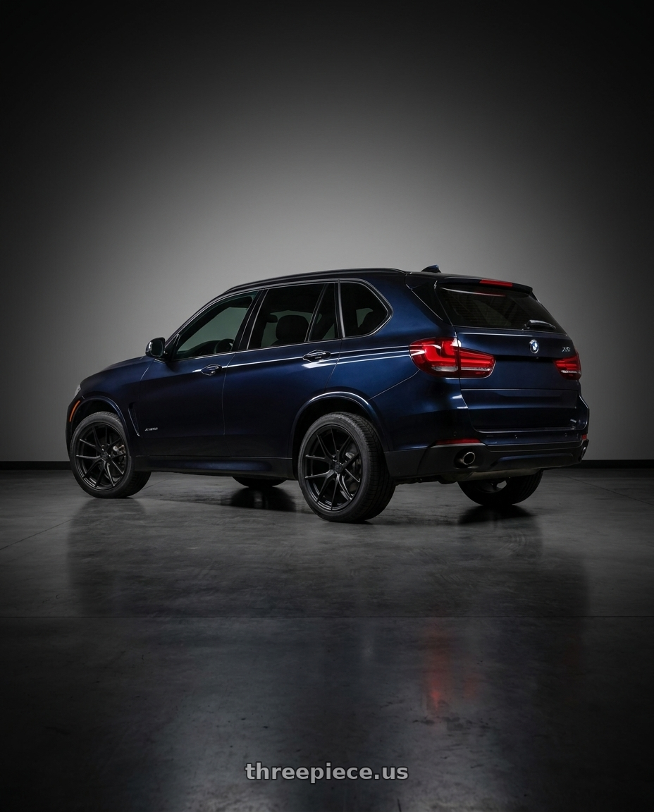 2014 BMW X5 with Aodhan AFF7 5x120 20x10.5+35 Matte Black wheels rear three quarter view square tires