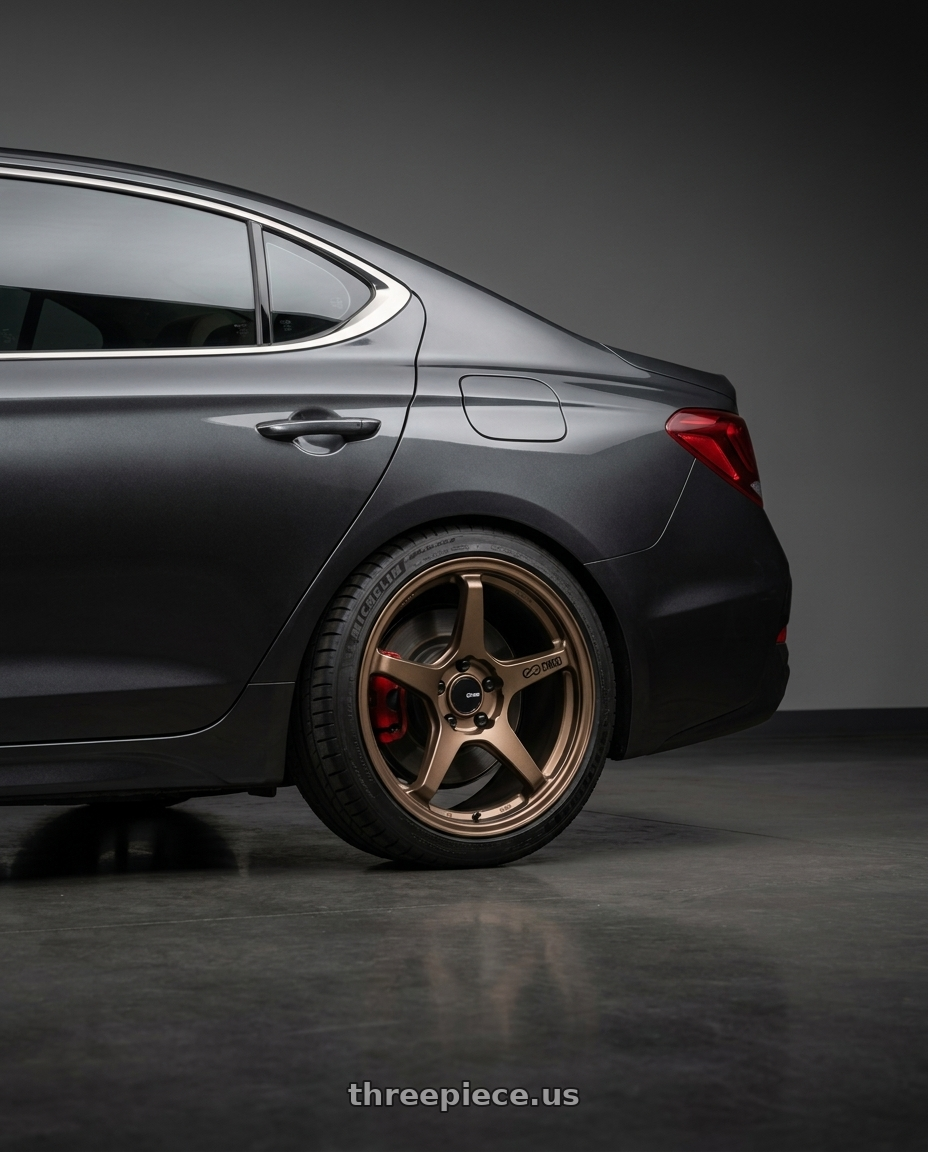 2019 Genesis G70 with Enkei TS-5 5x114.3 17x8+40 Bronze wheels rear three quarter view square tires