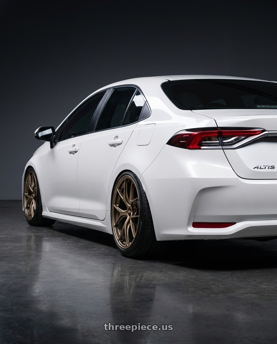 2023 Toyota Corolla Altis with BBS RI-D 5x108 19x9 +28 Diamond Gold wheels rear three quarter view slight stretch tires
