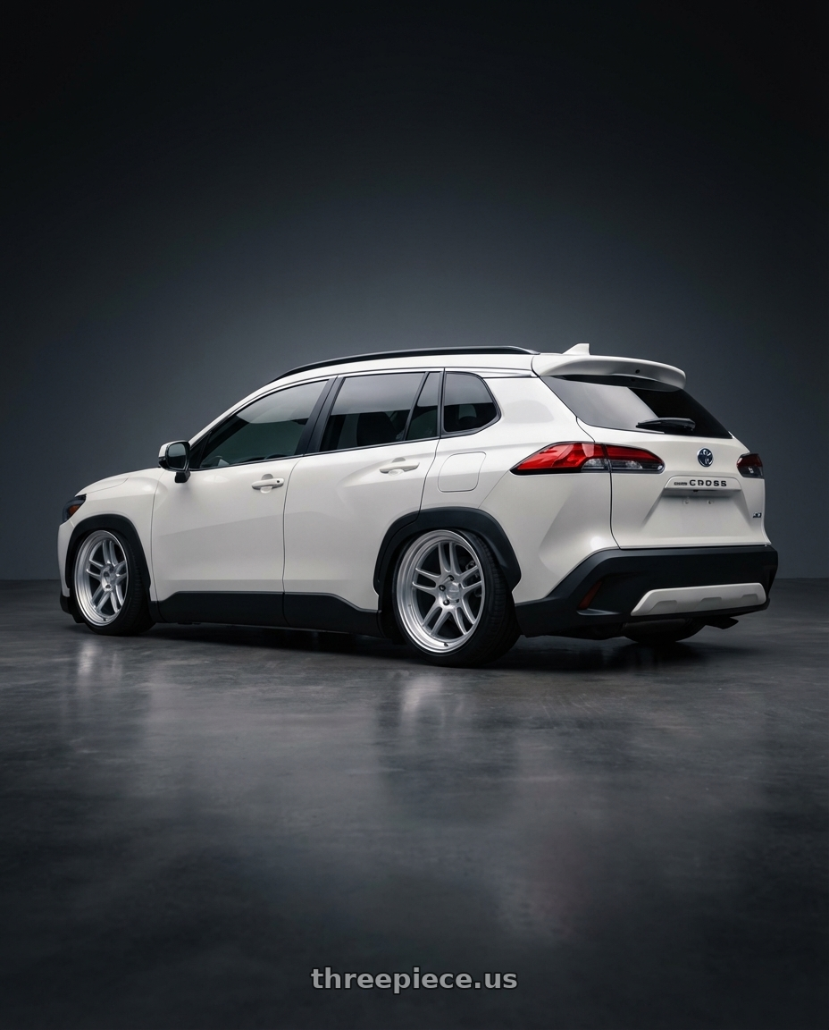 2023 Toyota Corolla Cross XSE Hybrid with Kansei K11S Tandem 5x114.3 18x9 12 Hyper Silver wheels rear three quarter view slight stretch tires