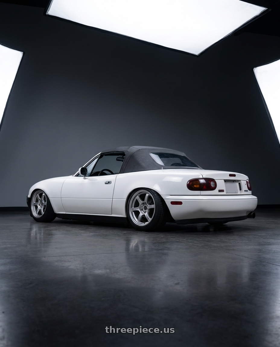 1994 mazda miata with Gram Lights 57DR 4x100 15x8+35 Grace Silver wheels rear three quarter view square tires