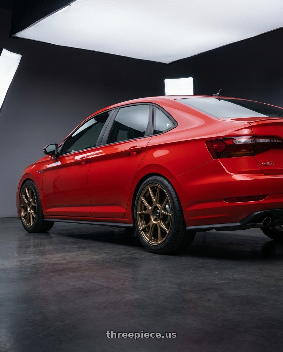 2023 Volkswagen Jetta GLI MK7 with Konig Ampliform 5x112 18x8.5+43 Gloss Bronze wheels rear three quarter view square tires