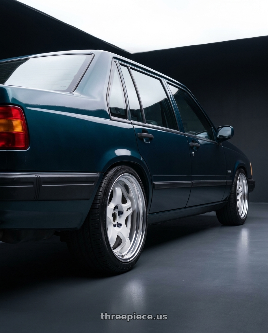 1991 Volvo 940 se with Work Meister S1 2P 5x108 15x6.5+12 R Disk Black wheels rear three quarter view square tires
