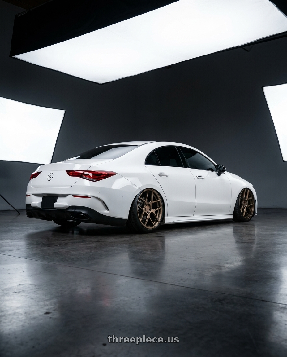 2023 Mercedes-Benz CLA C118 with Aodhan AFF2 5x112 19x8.5+35 Matte Bronze wheels rear three quarter view slight stretch tires