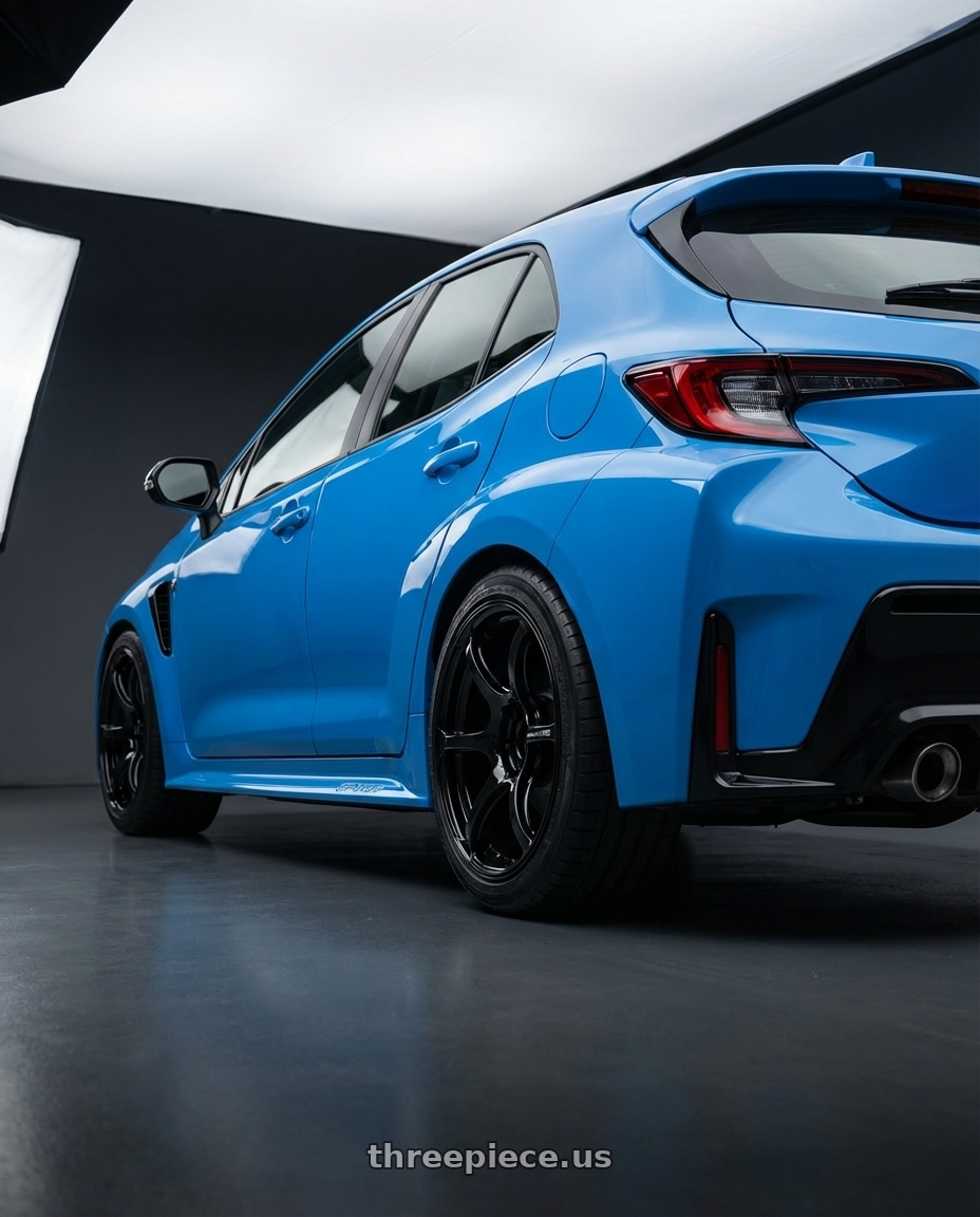 2024 Toyota GR Corolla with Advan RGIII 5x114.3 18x8.5+31 Gloss Black wheels rear three quarter view square tires