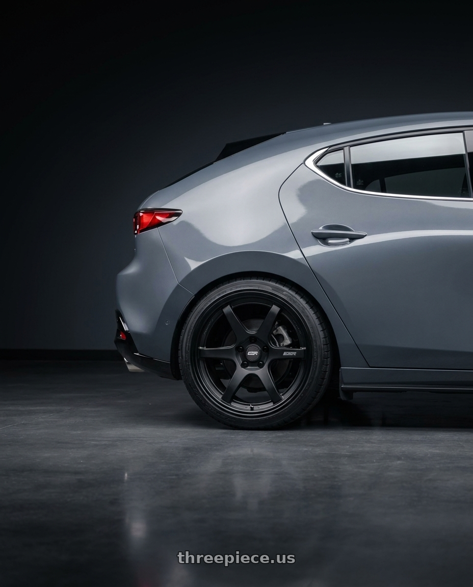 2023 Mazda Mazda3 Turbo with ESR Wheels APEX SERIES AP6 5x114.3 18x10.5 +22 Matte Black wheels rear three quarter view square tires