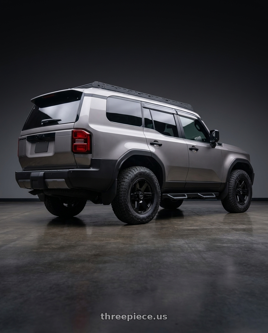 2024 toyota landcruiser with Raceline 942B Addict 6x139.7 18x8 35 Gloss Black wheels rear three quarter view square tires