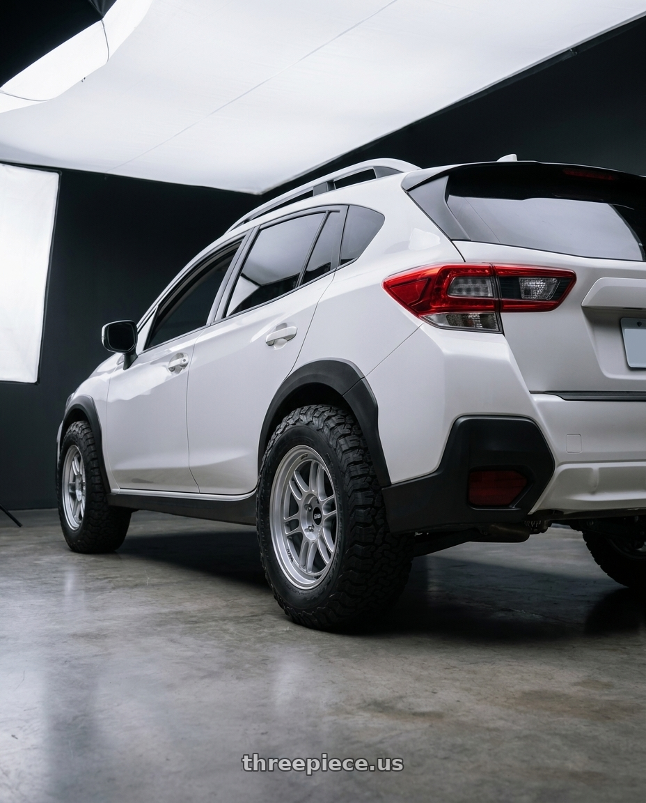 2022 SUBARU XV with Enkei RPF1 5x114.3 16x8+38  Silver wheels rear three quarter view meaty tires