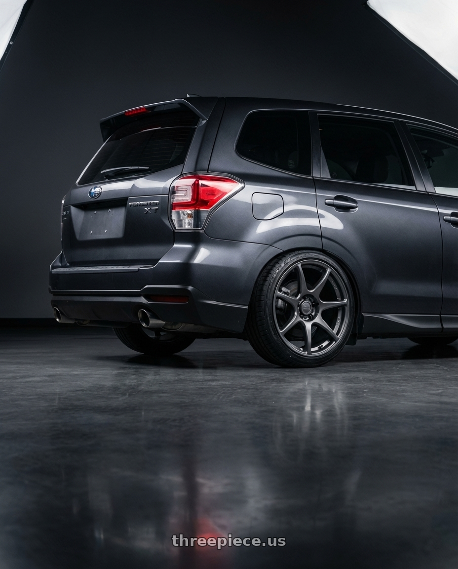 2017 Subaru Forester XT Dark Metallic Grey with Kansei K11G Tandem 5x114.3 19x9.5 22 Gunmetal wheels rear three quarter view slight stretch tires
