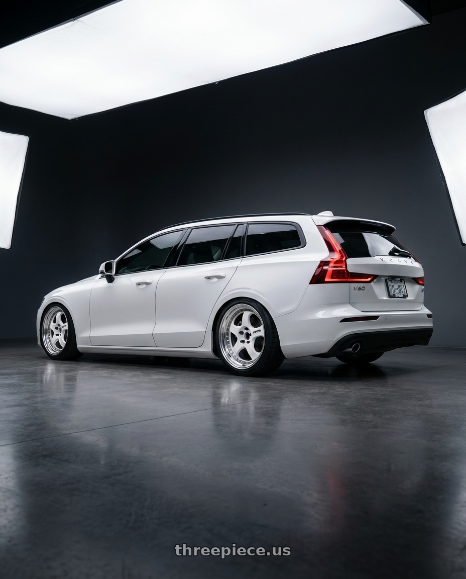 2020 Volvo V60 Momentum  with Work Meister S1 3P 5x108 19x8.5+41 A Disk White wheels rear three quarter view square tires