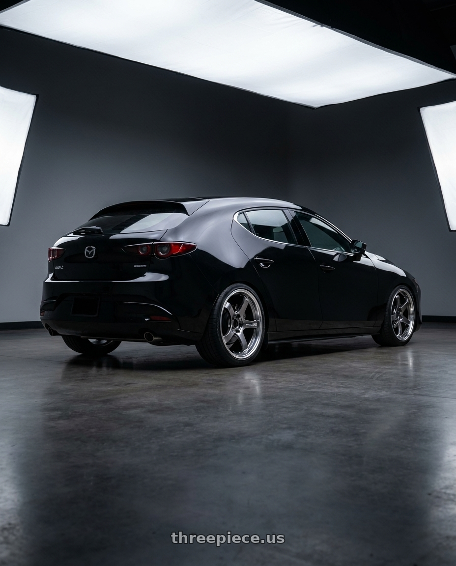 2023 mazda 3 with Advan Racing GT BEYOND 5x114.3 18x8.0 +44 MACHINING & HYPER PLATINUM BLACK wheels rear three quarter view square tires