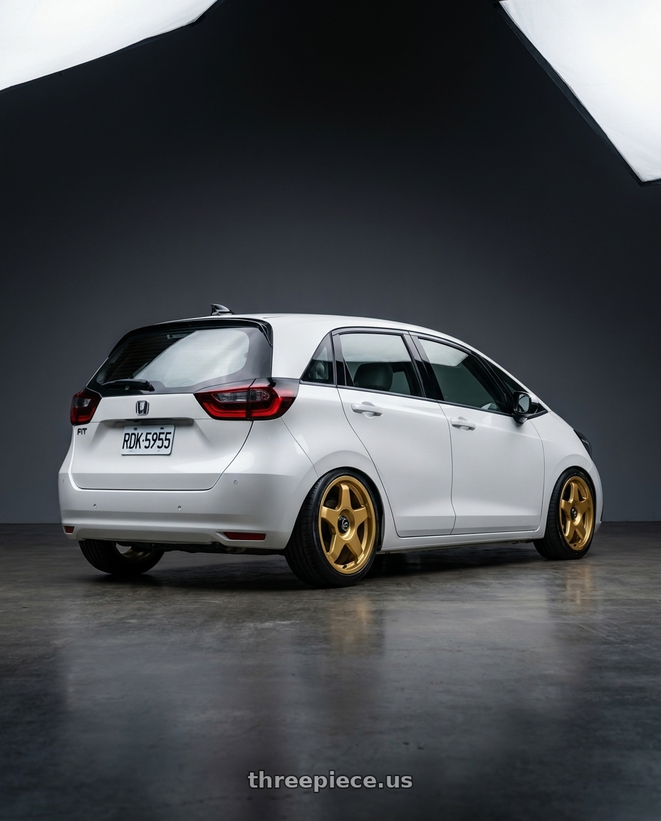 2021 Honda Fit with fifteen52 CHICANE 4x100 / 4x108 17x7.5 +42 GOLD (GLOSS GOLD) wheels rear three quarter view slight stretch tires