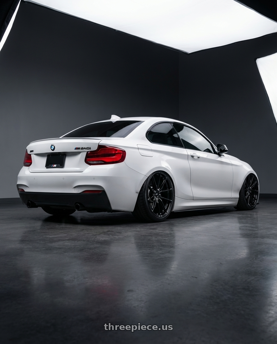 2018 BMW 2 Series F22 with Niche 1PC M240 RAINIER 5X120 19X9.5 +40 GLOSS BLACK wheels rear three quarter view slight stretch tires