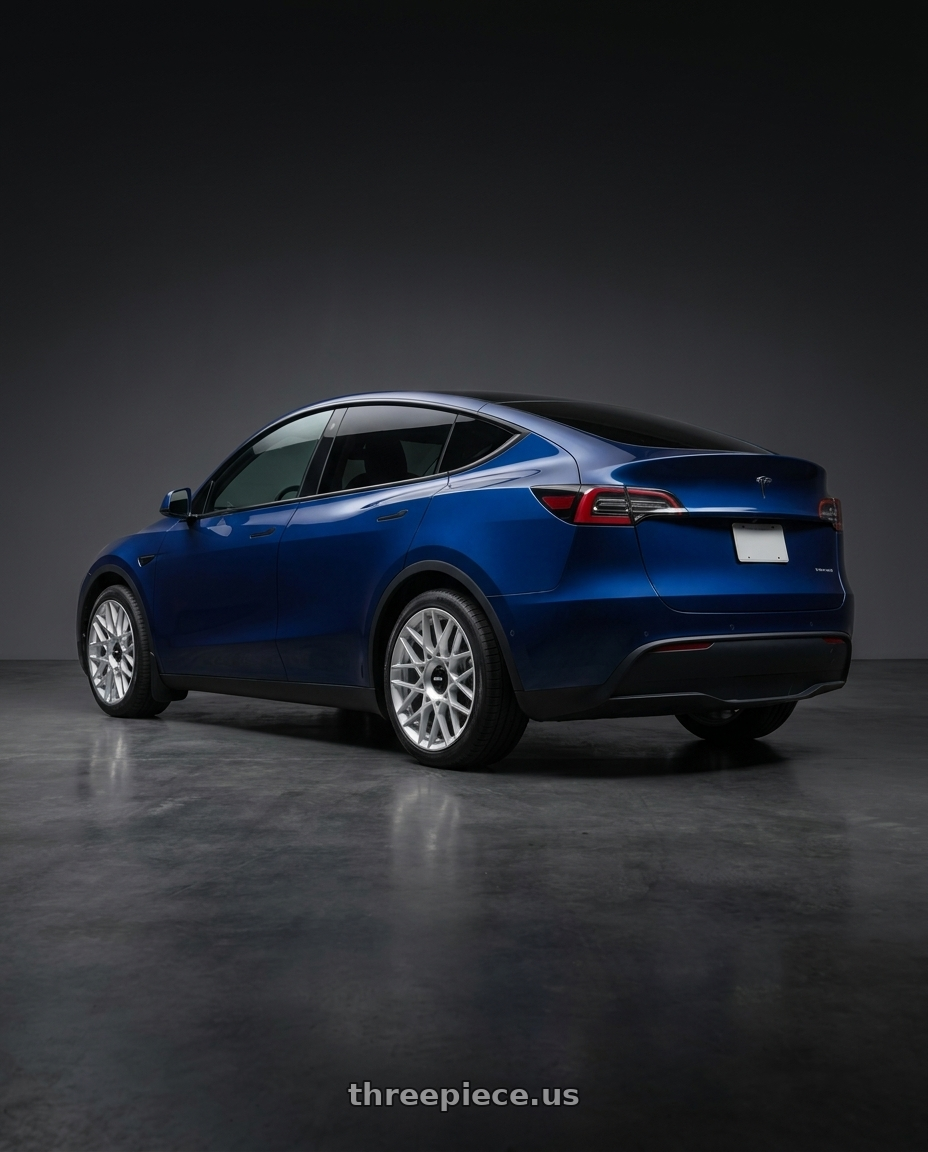 2023 Tesla Model Y with Rotiform 1PC R167 BLQ-C BLANK 19X8.5 +35 SILVER wheels rear three quarter view square tires