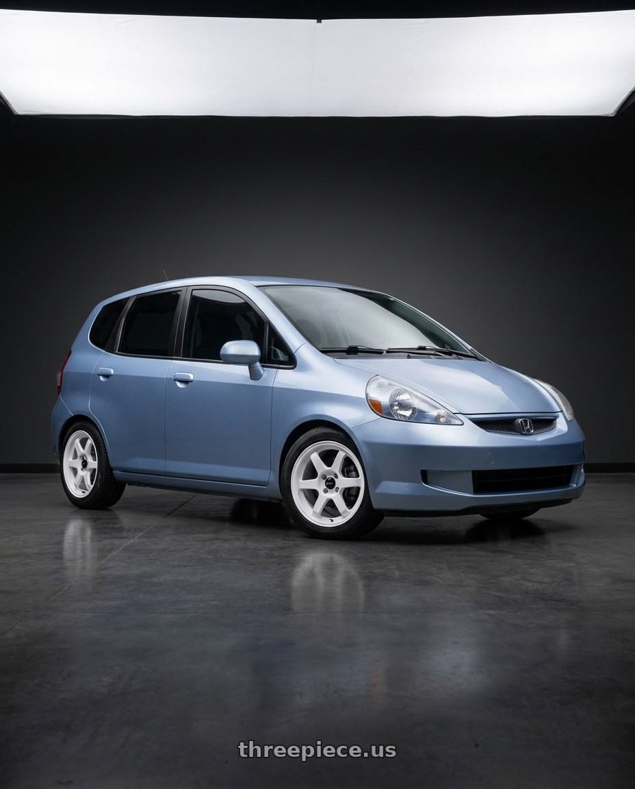 2008 Honda fit with Vors LT37 4x100 15x7  +40 White wheels