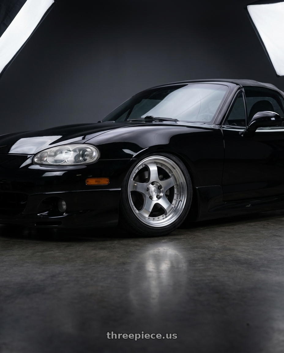 2002 Mazda Miata black with Aodhan AH03 4x100 / 4x114.3 16x8+15 Silver w/Machined Face wheels