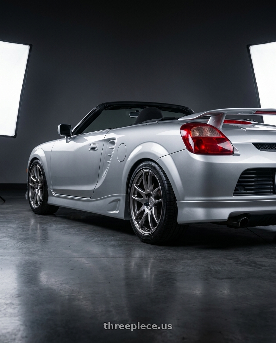 2001 Toyota MR2 Spyder Silver with Work Emotion Cr Kiwami 4x100 17x7 +38 Gt Silver wheels rear three quarter view square tires