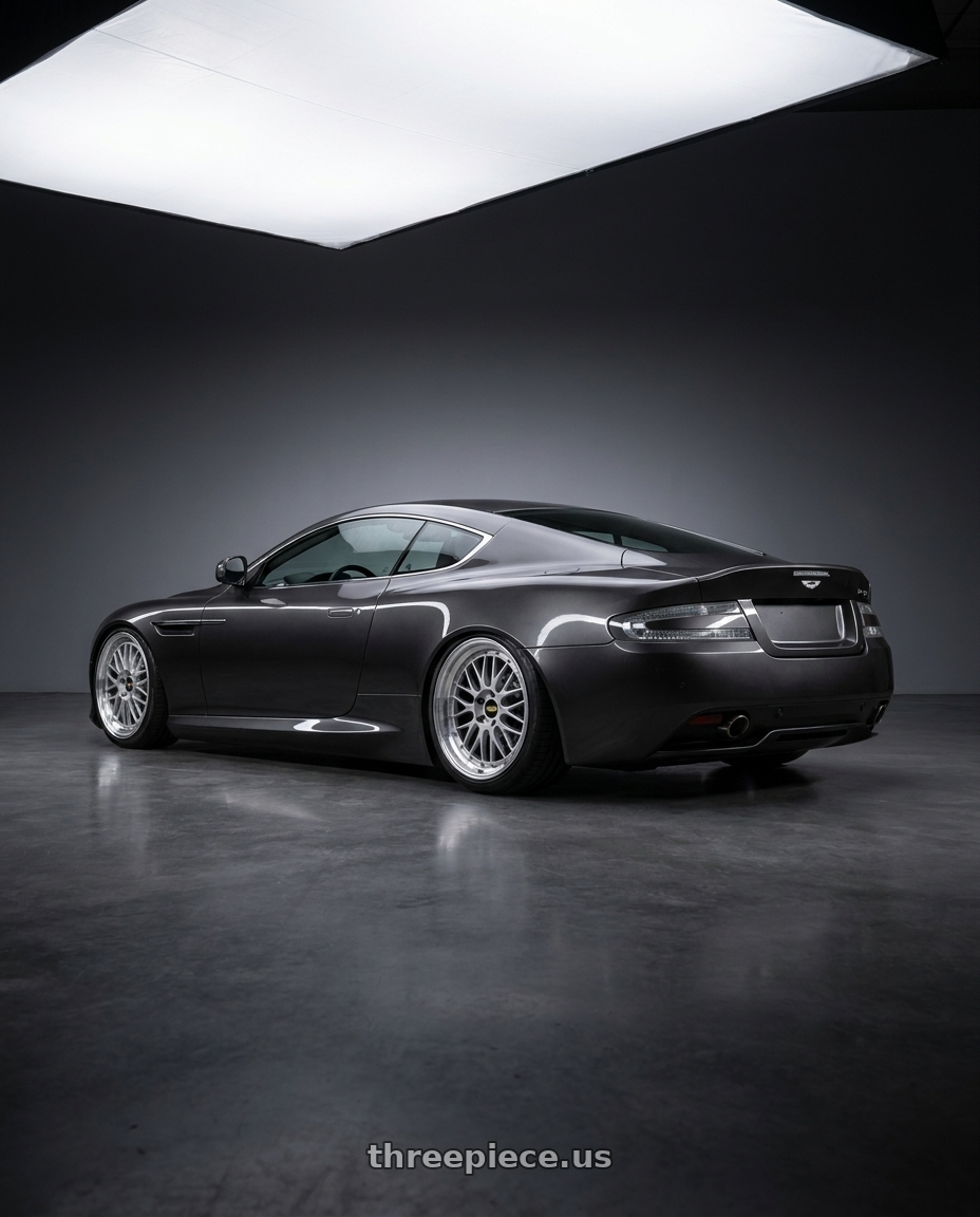 2011 Aston Martin Virage Dark with BBS LM 5x114.3 17x7.5+38 Diamond Silver wheels rear three quarter view square tires