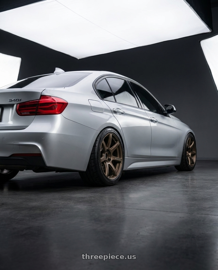 2017 BMW 340i with Work T7r 2P 5x120 19x8.5 +45 Matte Bronze wheels rear three quarter view meaty tires