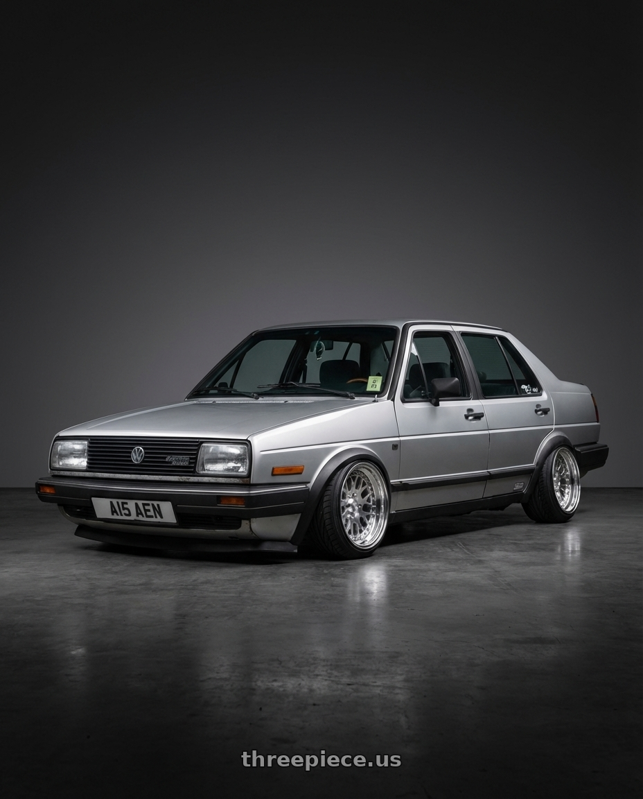 1985 VW Jetta Diesel with CCW CZ05 4x100 16x7.5 +0 Polished wheels front three quarter view stanced stance