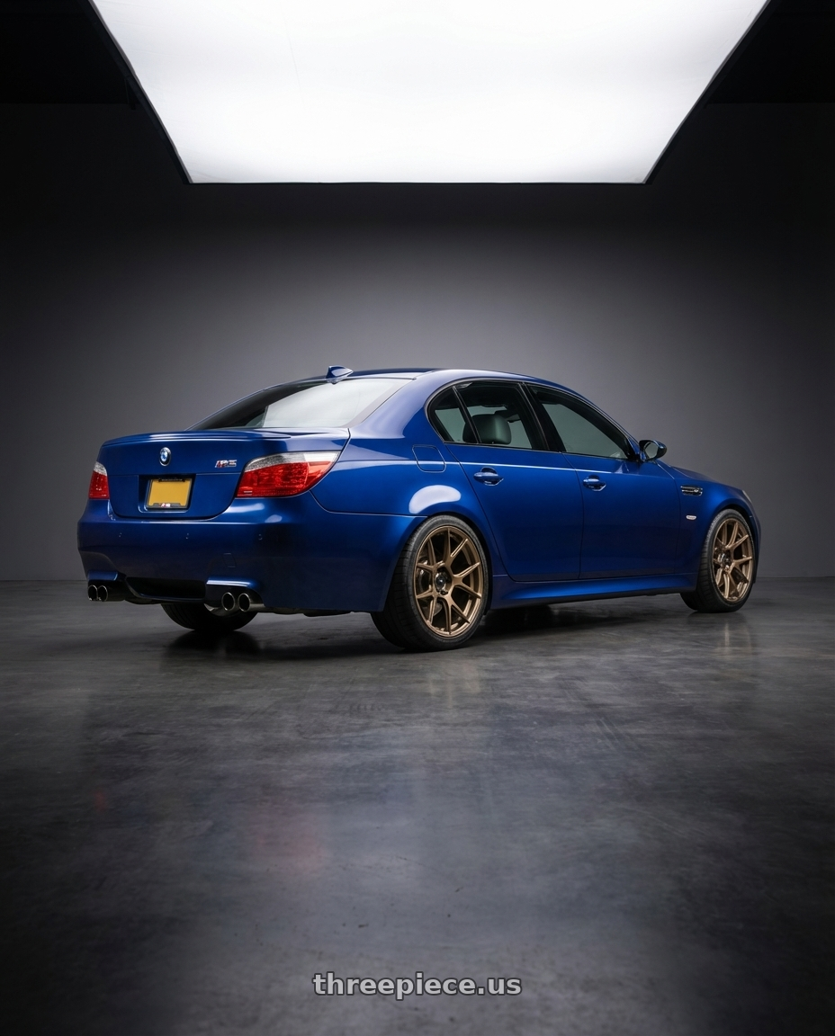 2010 BMW M5 E60 with Konig Ampliform 5x120 19x10+28 Gloss Bronze wheels rear three quarter view square tires