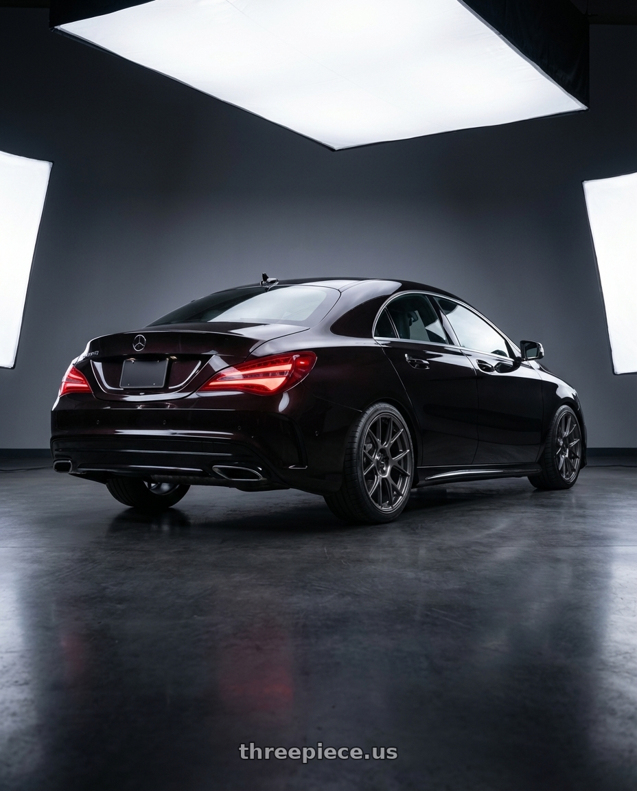 2018 Mercedes-Benz CLA C117 with Konig Ampliform 5x112 19x8.5+32 Dark Metallic Graphite wheels rear three quarter view square tires