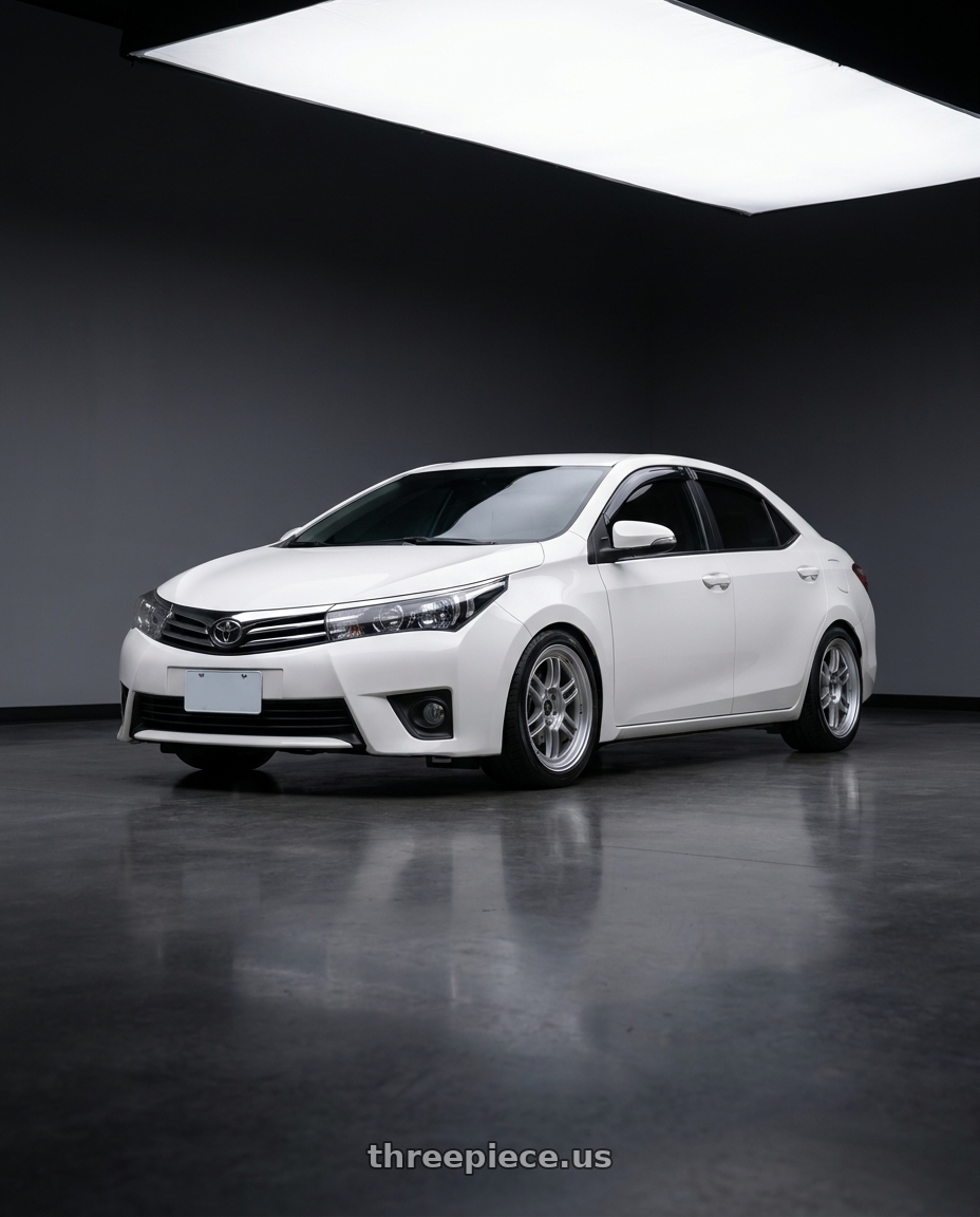 2014 Toyota Corolla with Enkei RPF1 5x100 17x7.5+48 Silver wheels front three quarter view lowered stance