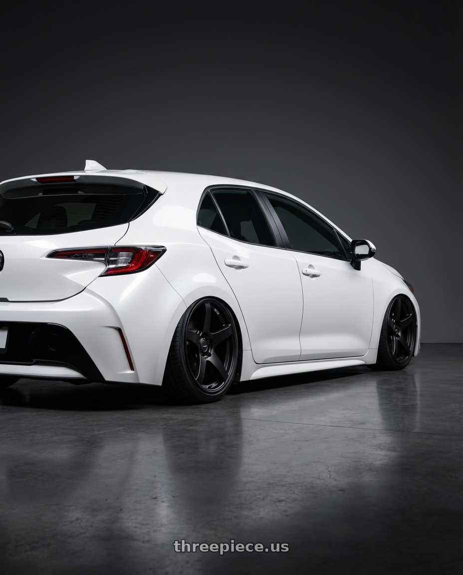2023 Toyota Corolla Hatchback with Ssr Gtv01 5x114.3 18x8+35  FLAT BLACK wheels rear three quarter view slight stretch tires