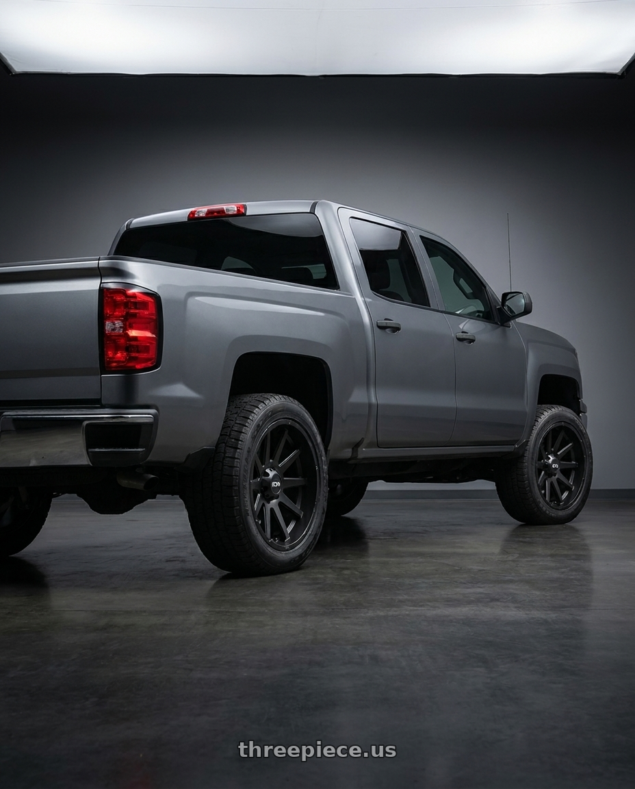 2018 Chevrolet Silverado 1500 SSV with Ion Type 143 6x139.7 20x9+0 Matte Black wheels rear three quarter view square tires