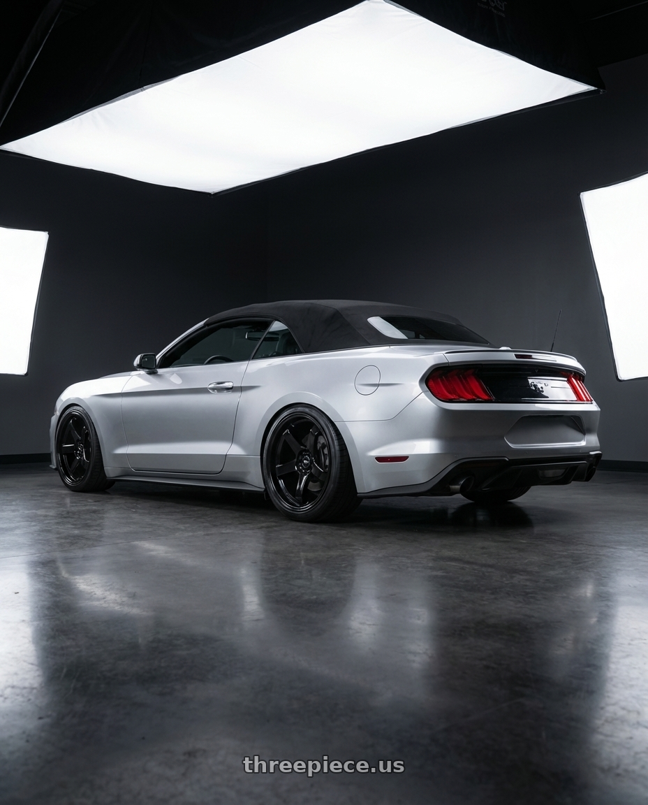 2018 ford mustang with F1R F106 5x108 18x8.5 +38 Gloss Black wheels rear three quarter view extreme stretch tires