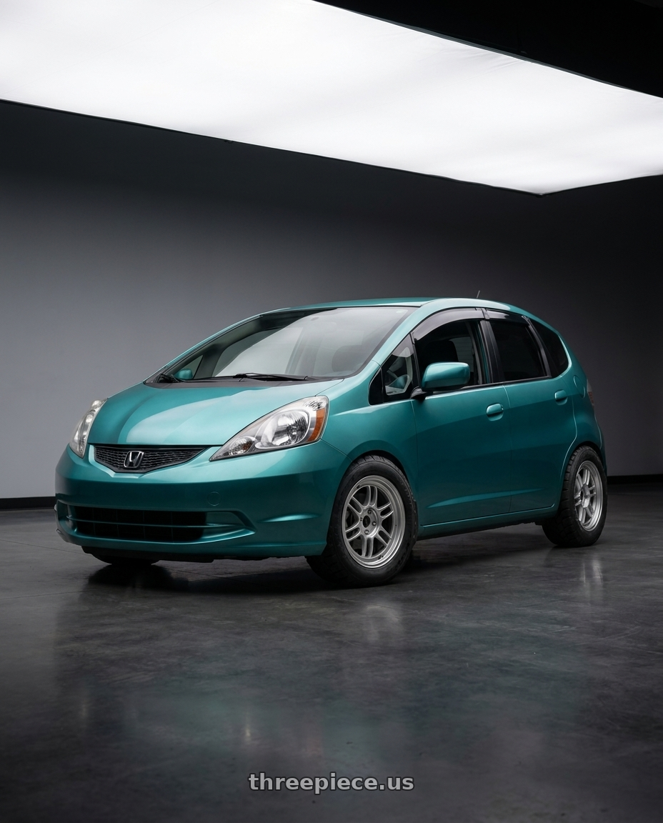 2014 Honda fit with Enkei RPF1 4x100 15x7+35 Silver wheels