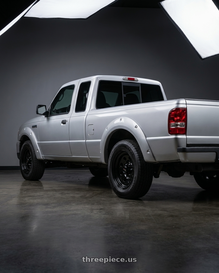 2011 Ford Ranger XLT with Vision HD 85H 5x114.3 15x8-29 Gloss Black wheels rear three quarter view square tires