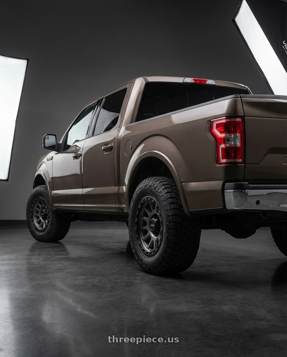 2019 Ford F-150 with Vision Off-Road 111 Nemesis 6x135 20x9+18 Gunmetal wheels rear three quarter view meaty tires