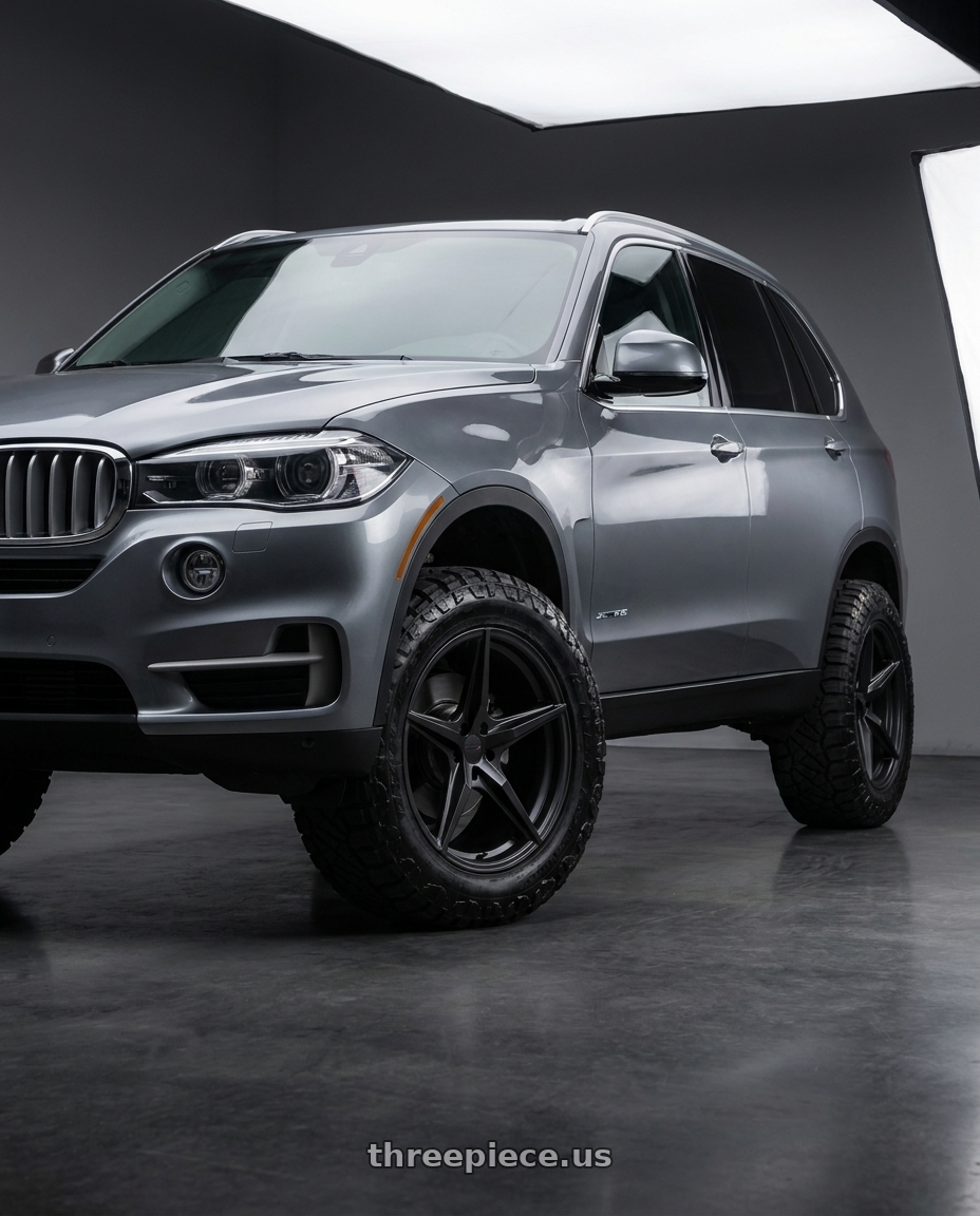 2018 BMW X5 with TSW ESPRIT 5x120 18x10.5 +25 Matte Black wheels front three quarter view lifted stance