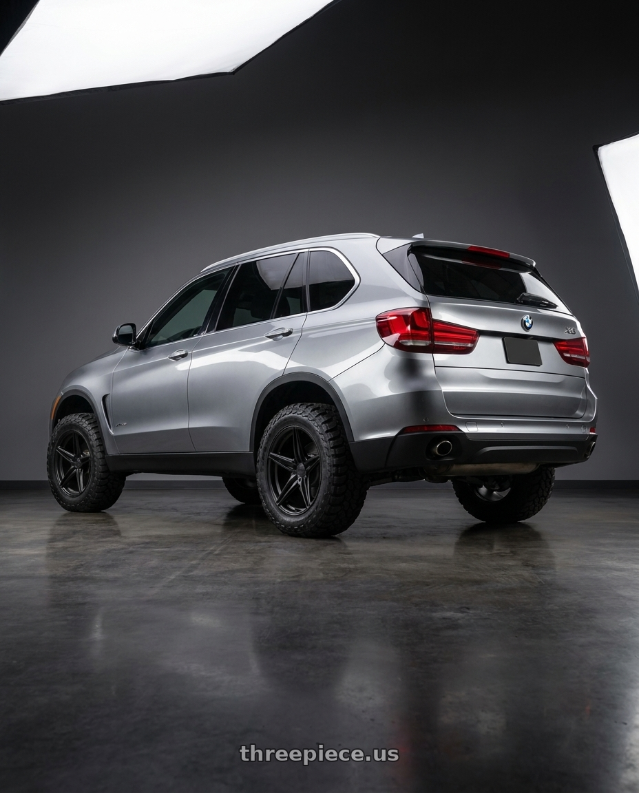 2018 BMW X5 with TSW ESPRIT 5x120 18x10.5 +25 Matte Black wheels rear three quarter view meaty tires