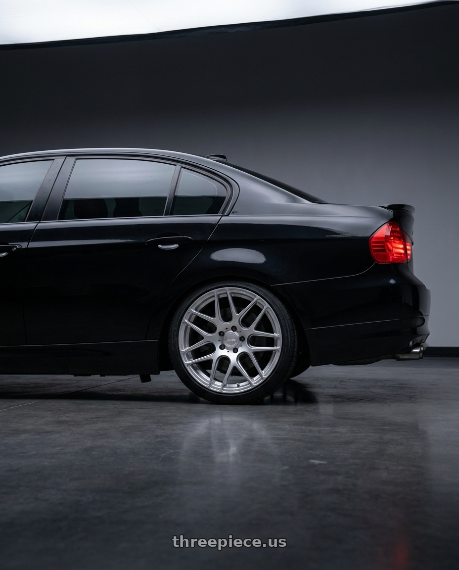 2011 bmw 335 with MRR FS1 5x120 19x9.5  +35 Liquid Silver wheels rear three quarter view square tires