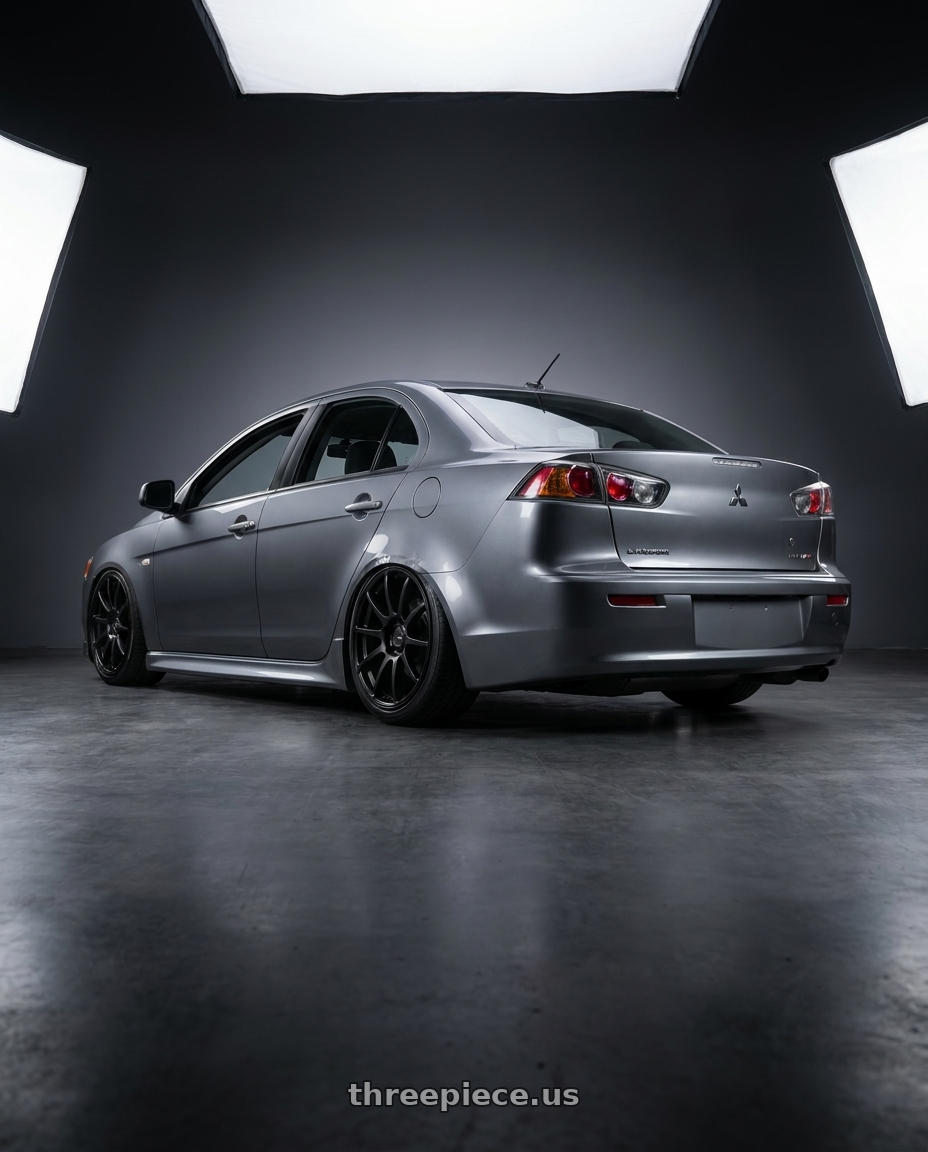 2014 Mitsubishi Lancer Ralliart with Ssr Gtv02 5x114.3 18x8.5+40  FLAT BLACK wheels rear three quarter view slight stretch tires