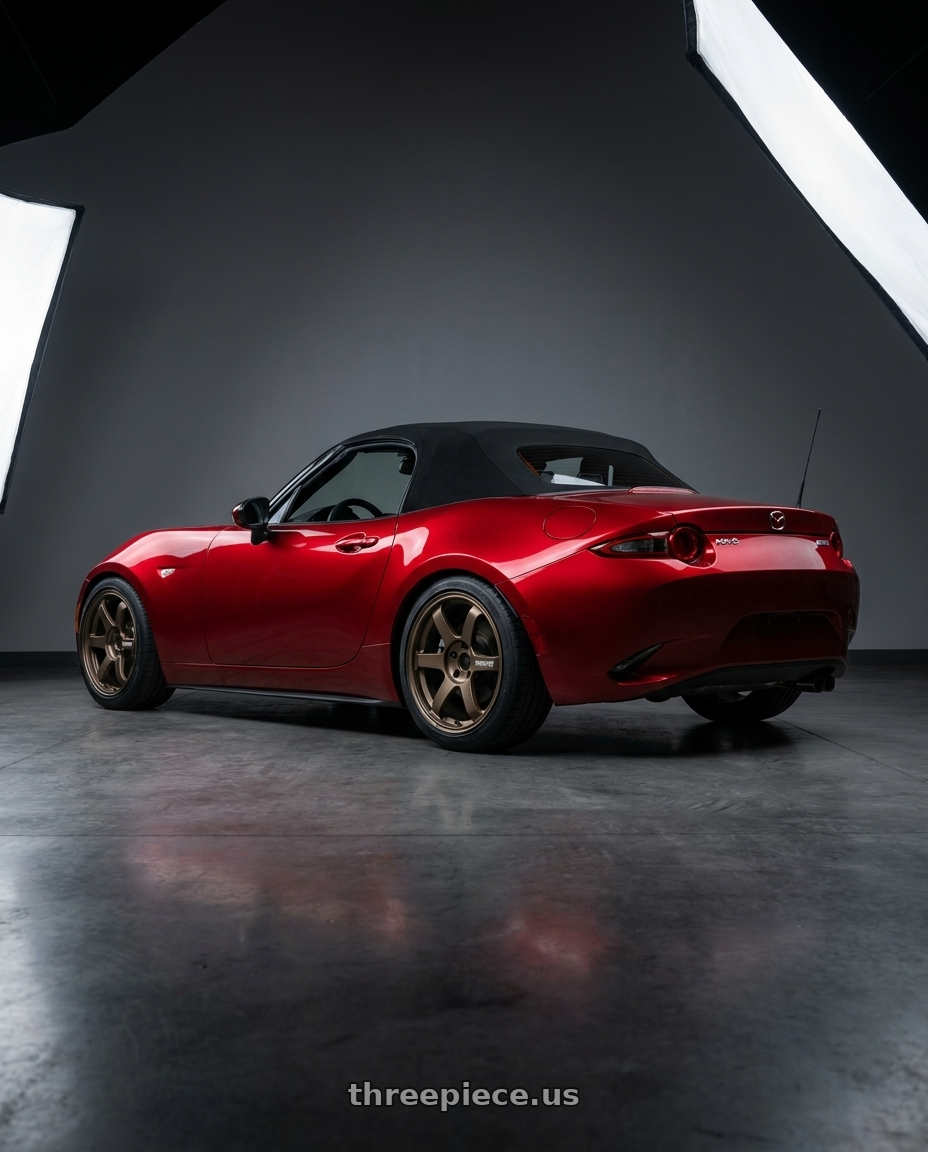2024 mazda mx5 with Volk Racing TE37 Saga S-Plus 4x100 17x7.5+38 Bronze wheels rear three quarter view square tires