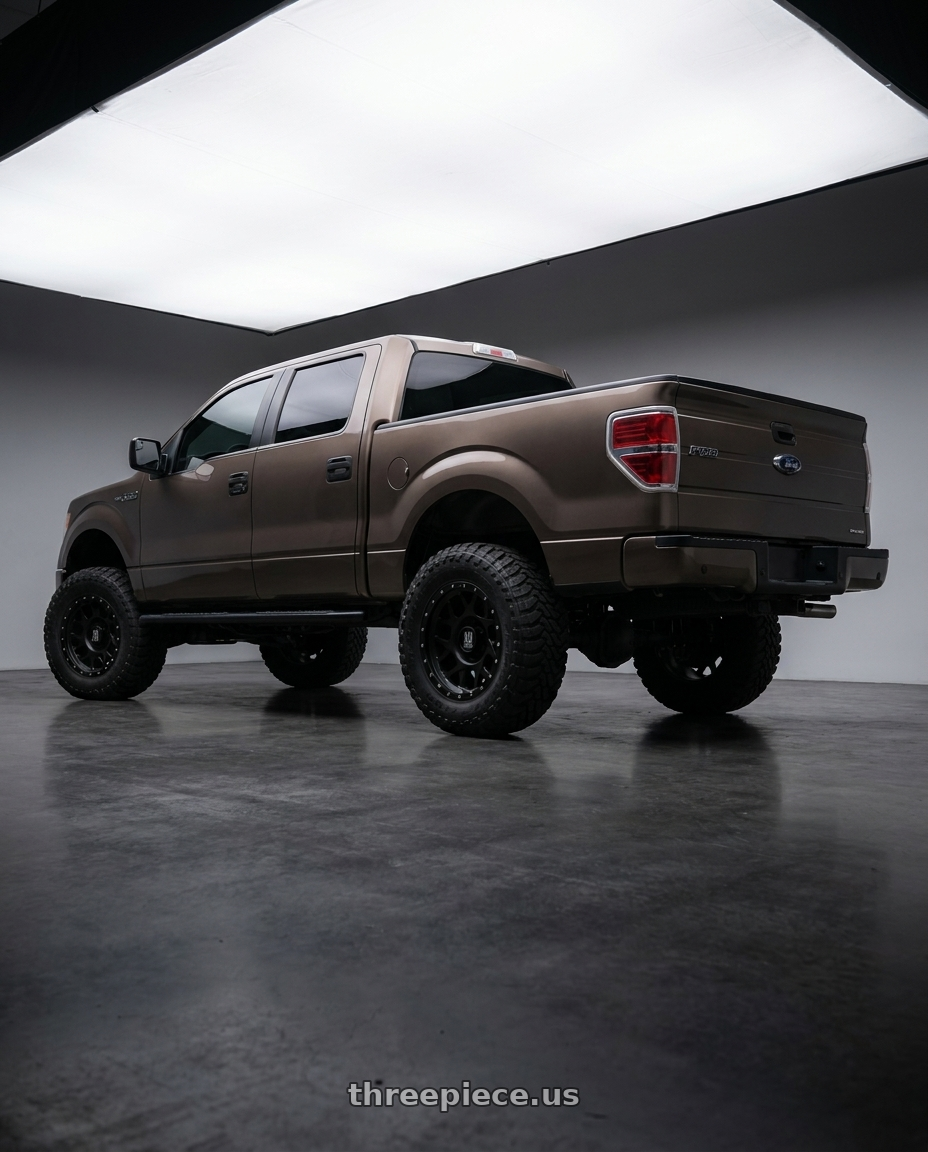2013 Ford F-150 with XD XD127 BULLY 6X135 20X9 +18 SATIN BLACK WITH REINFORCING RING wheels rear three quarter view meaty tires